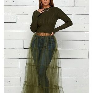 Quality material with good stretch. Sweater and tulip one piece